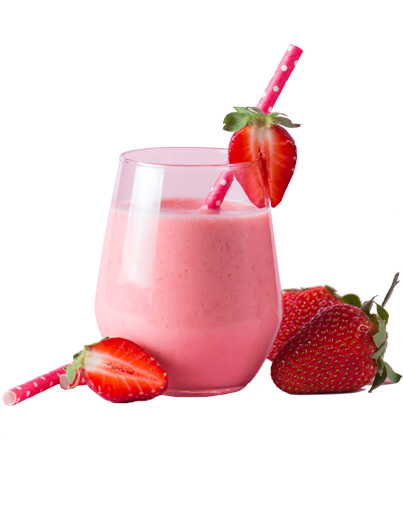cup of strawberry smoothie with strawberries pieces around it